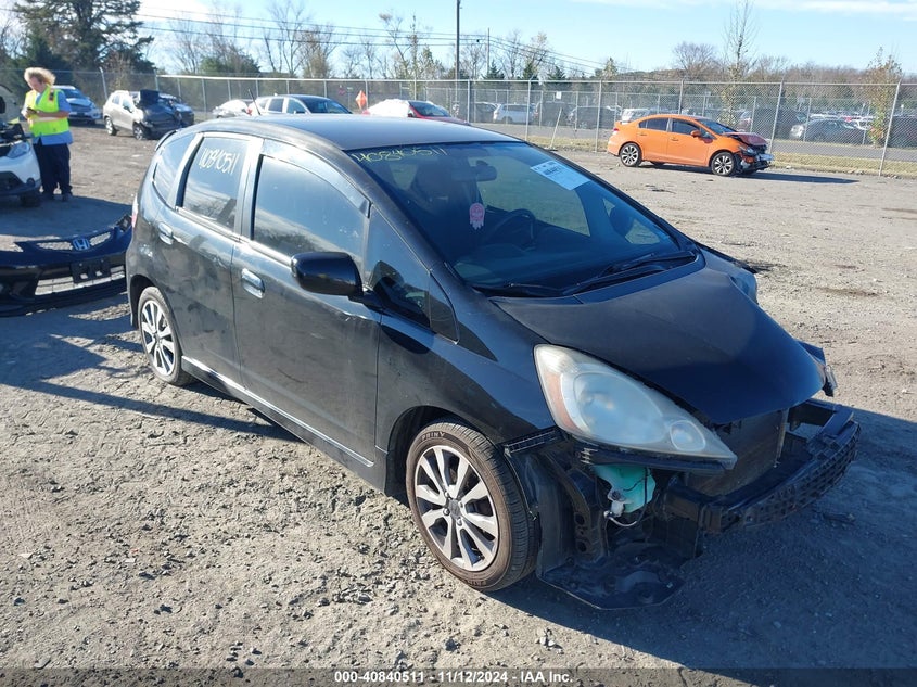 2009 HONDA FIT VIN: JHMGE874X9S040917