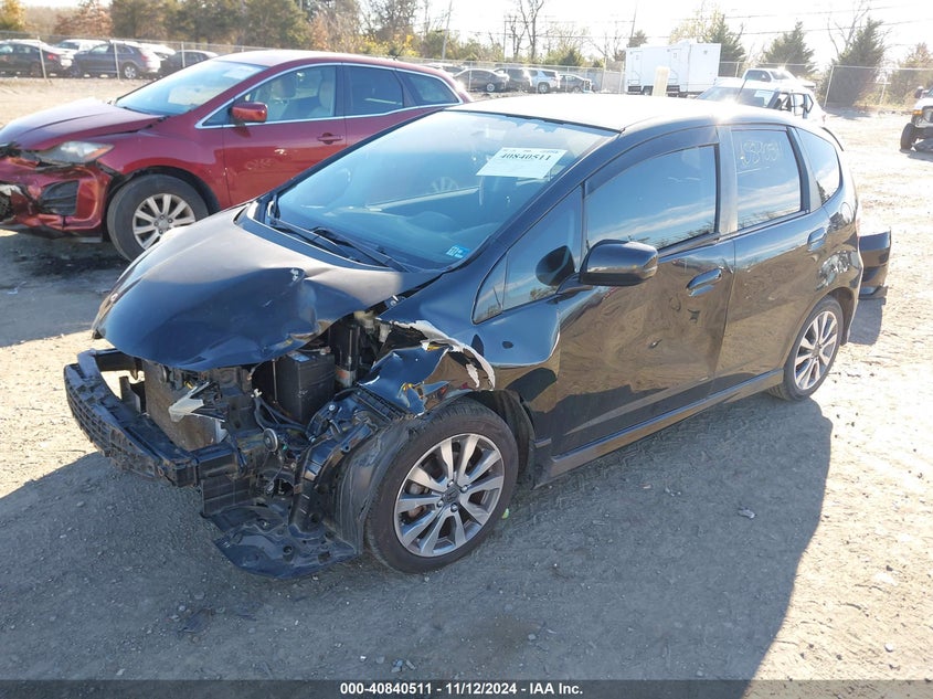 2009 HONDA FIT VIN: JHMGE874X9S040917