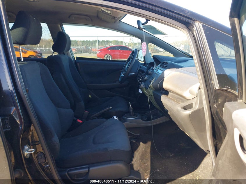 2009 HONDA FIT VIN: JHMGE874X9S040917