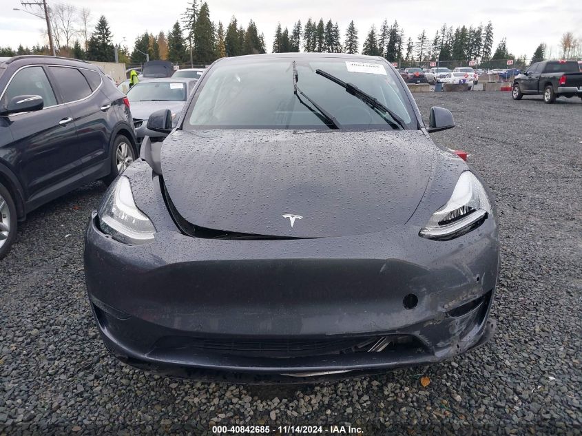 2022 Tesla Model Y Long Range Dual Motor All-Wheel Drive VIN: 7SAYGAEE8NF570624 Lot: 40842685