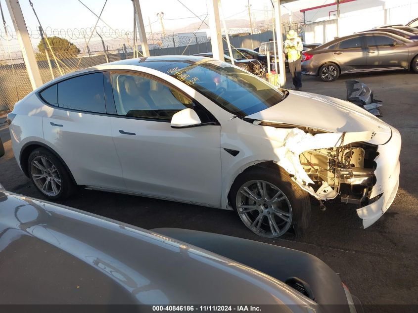 2023 Tesla Model Y Awd/Long Range Dual Motor All-Wheel Drive VIN: 7SAYGDEE3PA124530 Lot: 40846186