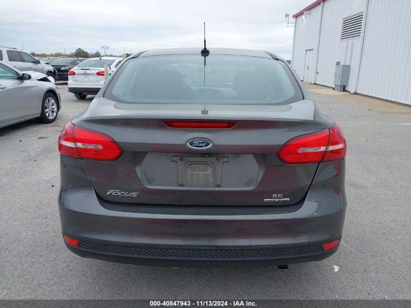 VIN 1FADP3F28GL213686 2016 Ford Focus, SE no.16