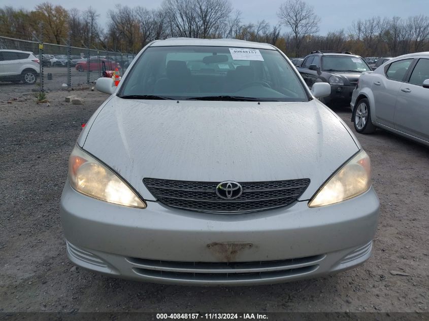 2004 Toyota Camry Le V6 VIN: 4T1BF32K14U586595 Lot: 40848157