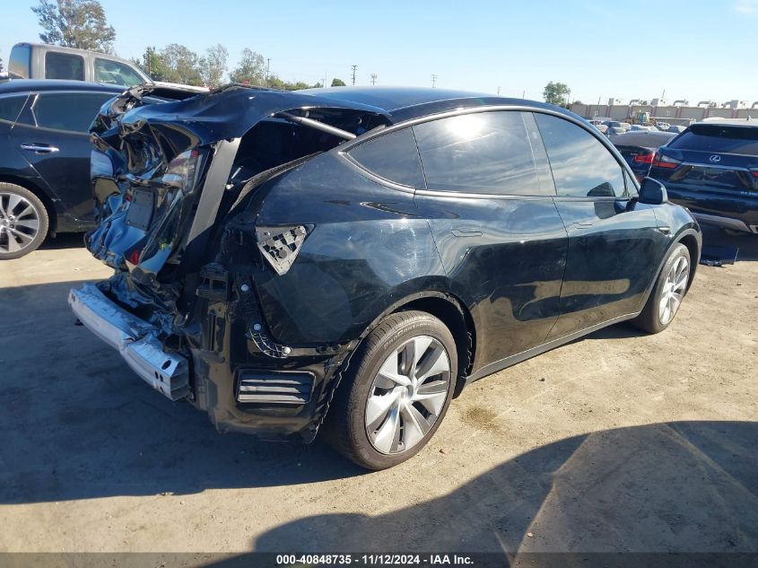 2023 Tesla Model Y Awd/Long Range Dual Motor All-Wheel Drive VIN: 7SAYGAEE0PF868345 Lot: 40848735