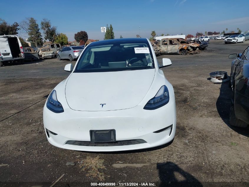 2023 Tesla Model Y Awd/Long Range Dual Motor All-Wheel Drive VIN: 7SAYGDEE4PA136010 Lot: 40849998