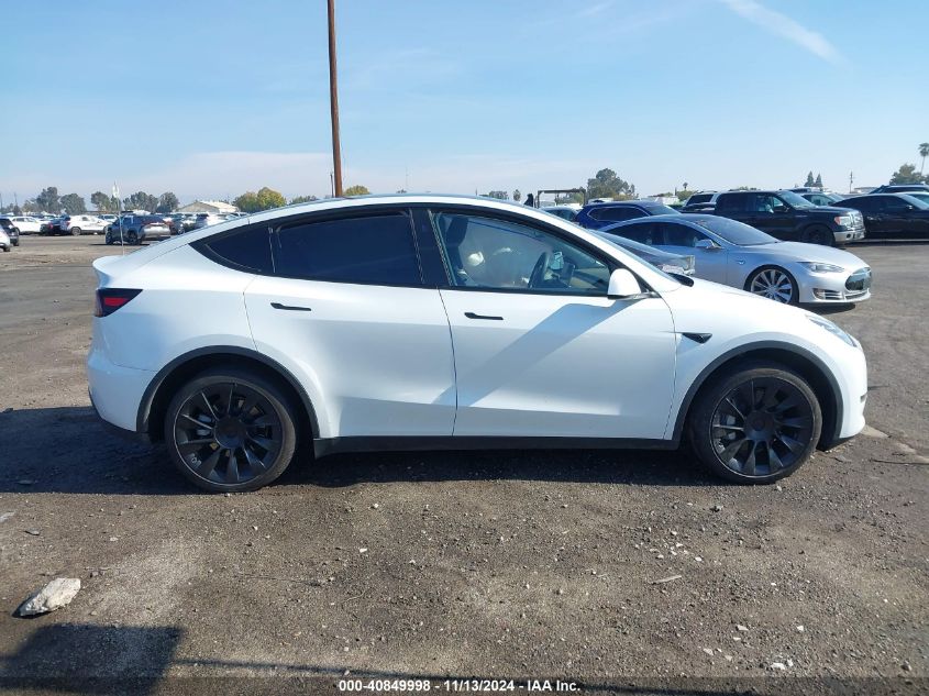 2023 Tesla Model Y Awd/Long Range Dual Motor All-Wheel Drive VIN: 7SAYGDEE4PA136010 Lot: 40849998