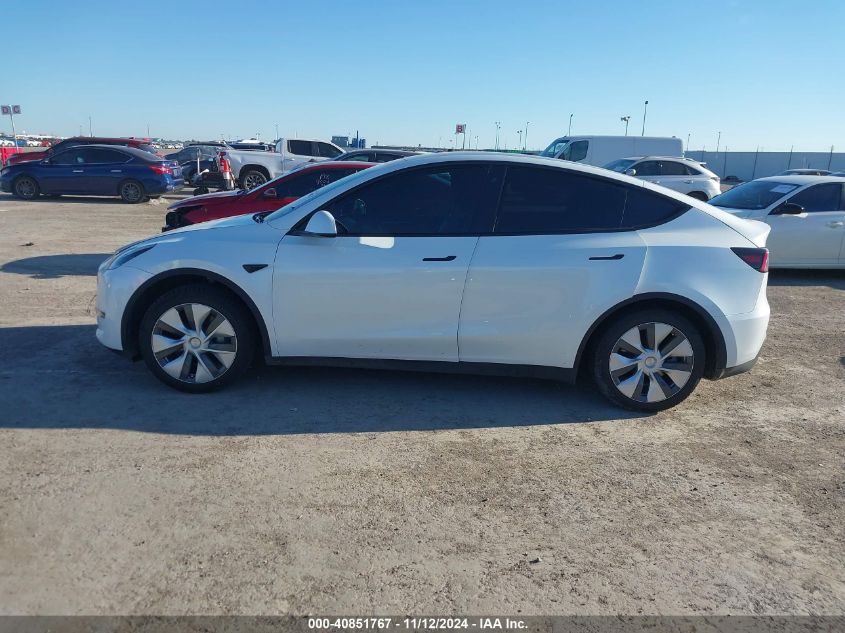 2023 Tesla Model Y Awd/Long Range Dual Motor All-Wheel Drive VIN: 7SAYGDEEXPA036686 Lot: 40851767