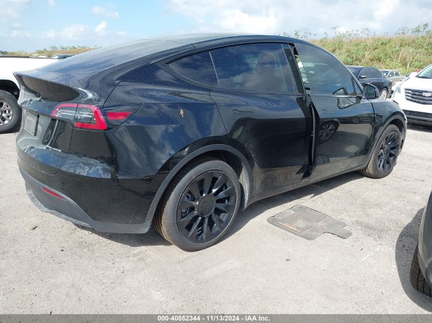 VIN 7SAYGDEE7PA187436 2023 Tesla Model Y, Awd/Long... no.4