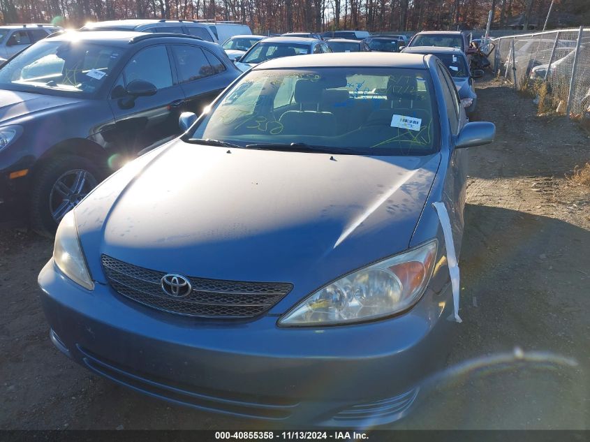 2004 Toyota Camry Le VIN: 4T1BE30K34U810701 Lot: 40855358