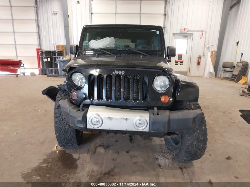 2011 Jeep Wrangler Unlimited Sahara VIN: 1J4BA5H17BL633574 Lot: 40855802