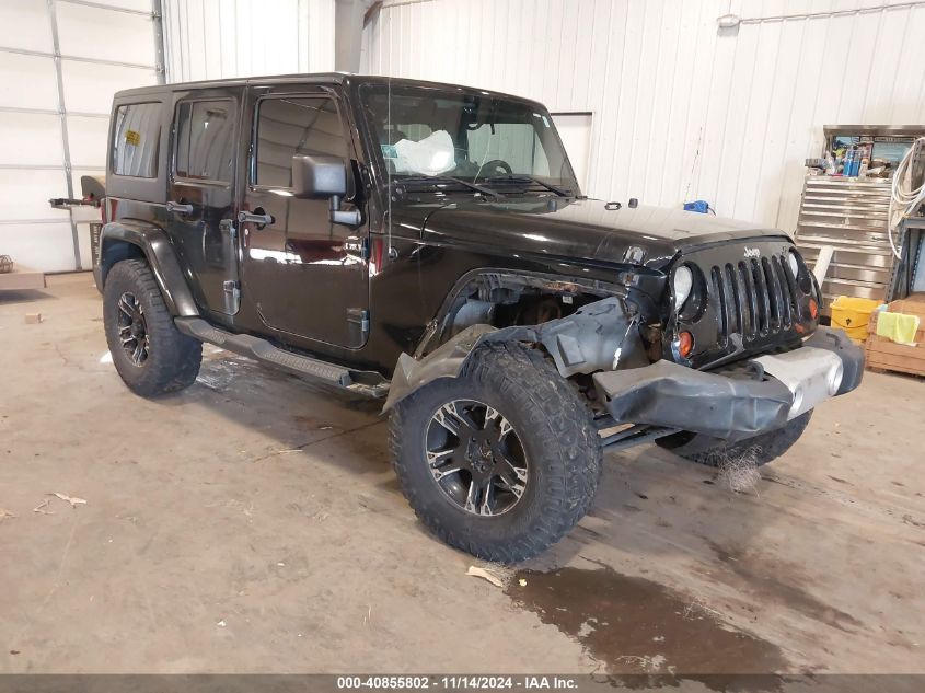 2011 Jeep Wrangler Unlimited Sahara VIN: 1J4BA5H17BL633574 Lot: 40855802