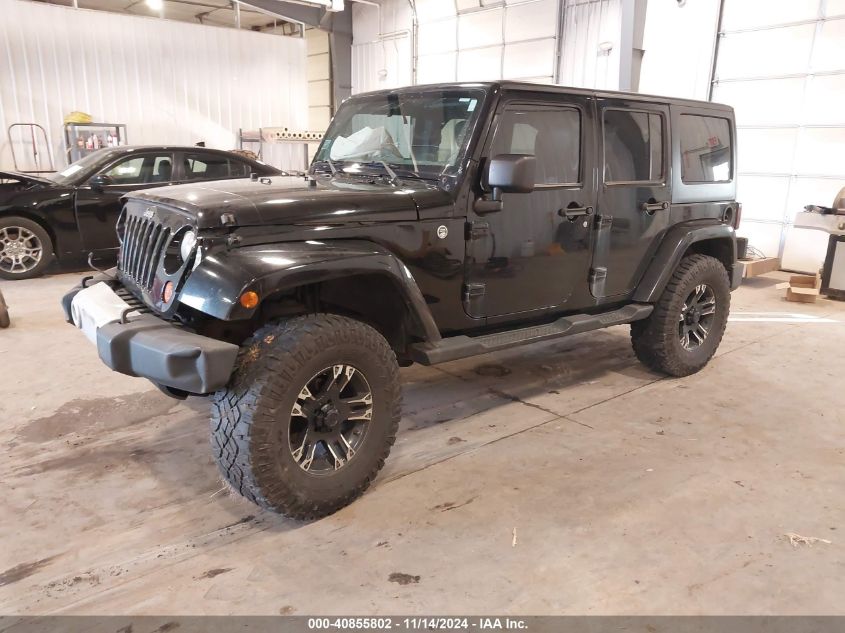 2011 Jeep Wrangler Unlimited Sahara VIN: 1J4BA5H17BL633574 Lot: 40855802