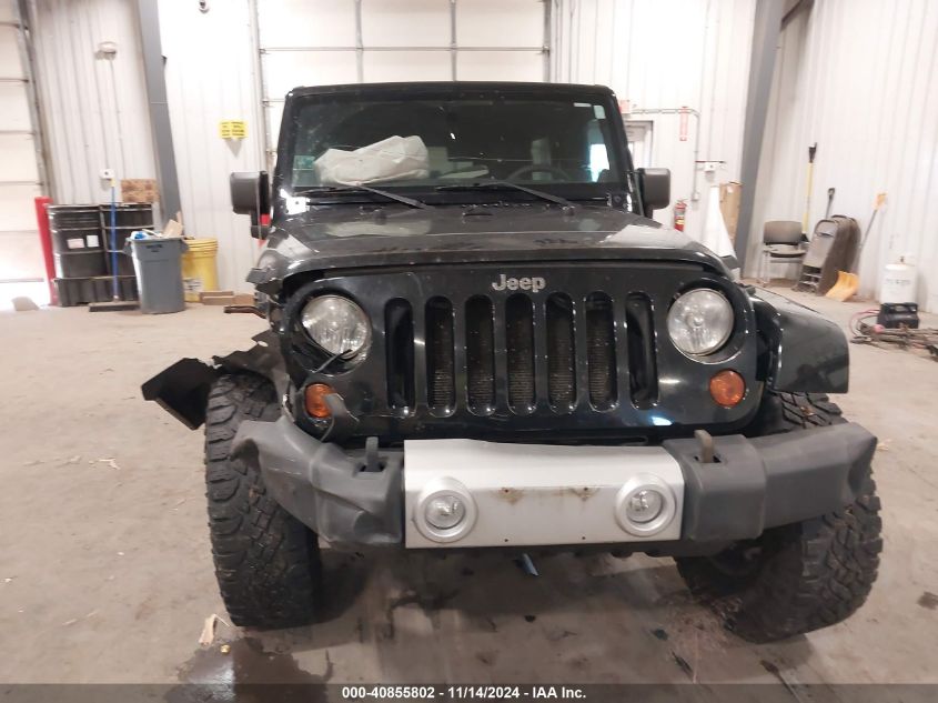 2011 Jeep Wrangler Unlimited Sahara VIN: 1J4BA5H17BL633574 Lot: 40855802