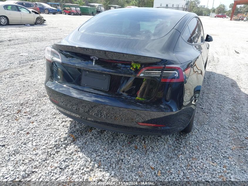 2021 Tesla Model 3 Standard Range Plus Rear-Wheel Drive VIN: 5YJ3E1EAXMF090352 Lot: 40856564