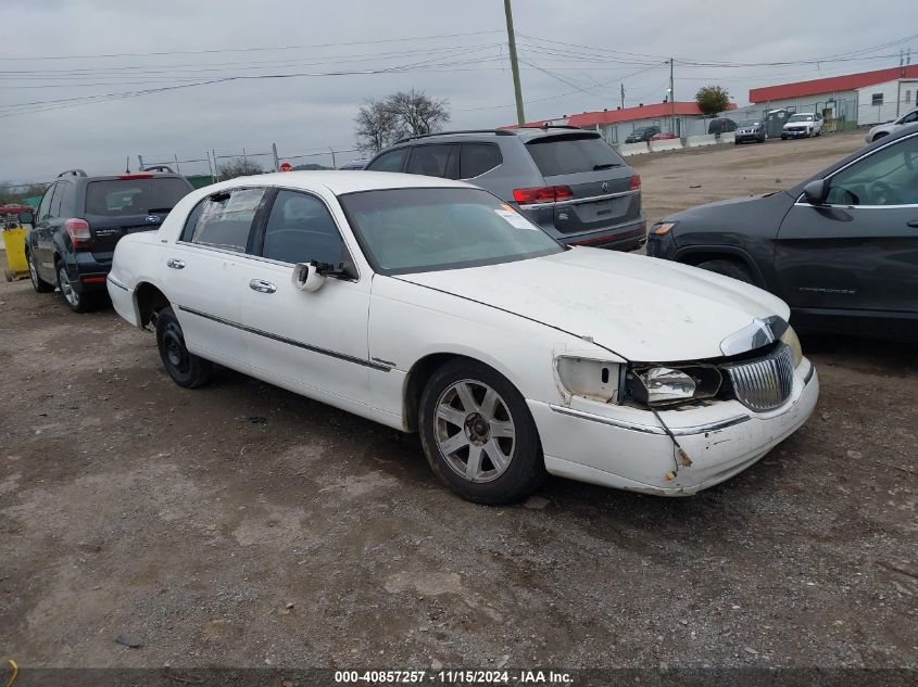 2000 Lincoln Town Car Executive VIN: 1LNHM81W0YY815963 Lot: 40857257