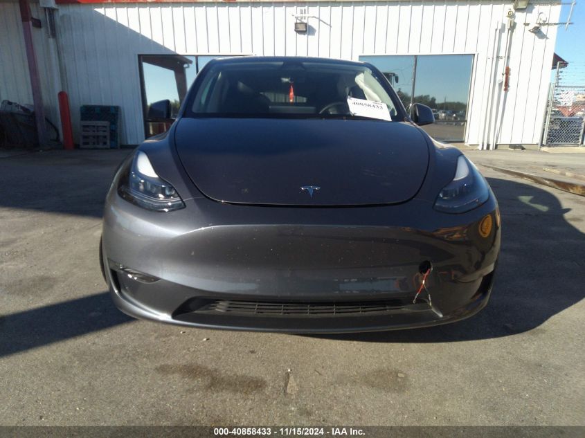 2023 Tesla Model Y Awd/Long Range Dual Motor All-Wheel Drive VIN: 7SAYGDEE1PF921037 Lot: 40858433