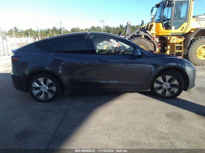 2023 Tesla Model Y Awd/Long Range Dual Motor All-Wheel Drive VIN: 7SAYGDEE1PF921037 Lot: 40858433