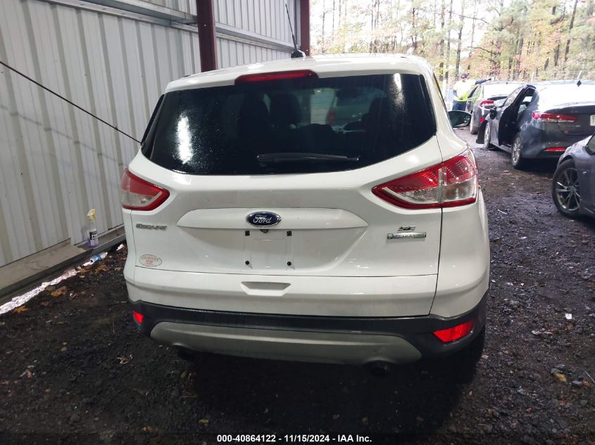 VIN 1FMCU0GX9EUC70053 2014 Ford Escape, SE no.16