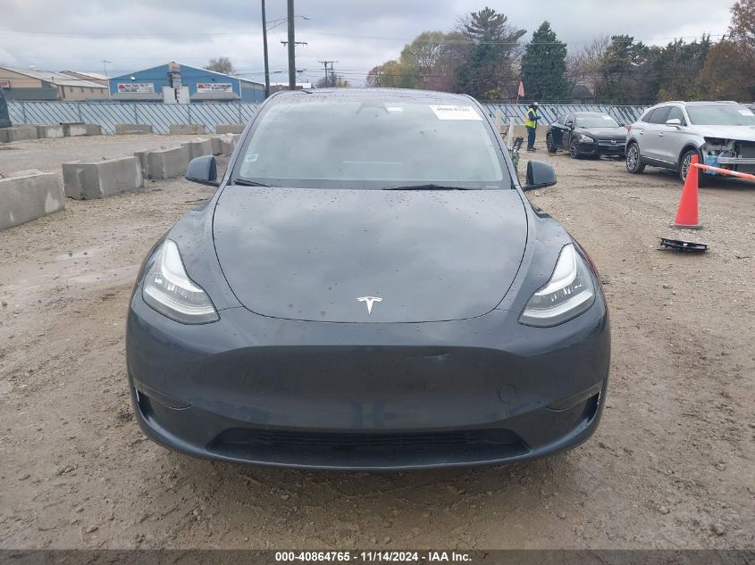 2023 Tesla Model Y Awd/Long Range Dual Motor All-Wheel Drive VIN: 7SAYGDEEXPA084432 Lot: 40864765