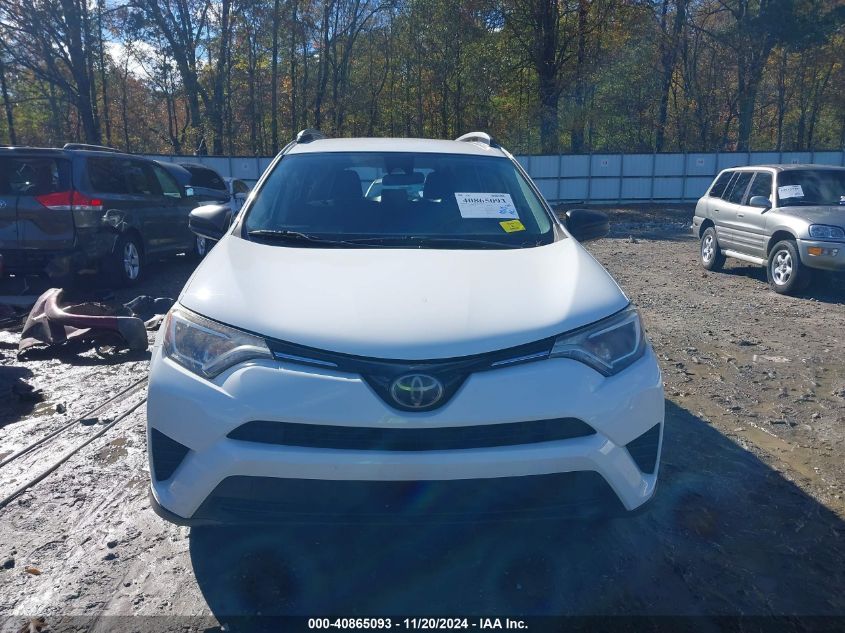 2018 Toyota Rav4 Le VIN: JTMZFREV9JJ725316 Lot: 40865093