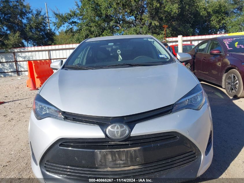 2019 Toyota Corolla Le VIN: 5YFBURHE8KP900140 Lot: 40865267