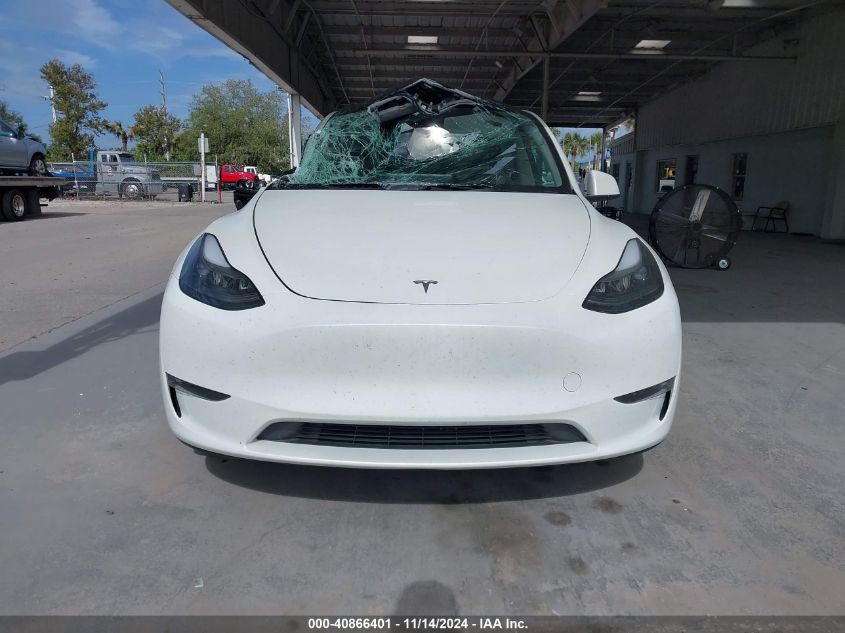 2024 Tesla Model Y Long Range Dual Motor All-Wheel Drive VIN: 7SAYGAEE0RF100657 Lot: 40866401