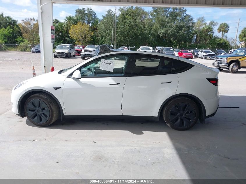 2024 Tesla Model Y Long Range Dual Motor All-Wheel Drive VIN: 7SAYGAEE0RF100657 Lot: 40866401