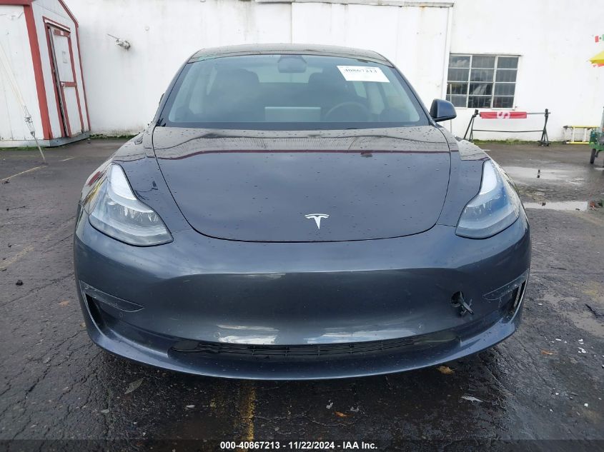 2021 Tesla Model 3 Long Range Dual Motor All-Wheel Drive VIN: 5YJ3E1EB8MF065572 Lot: 40867213