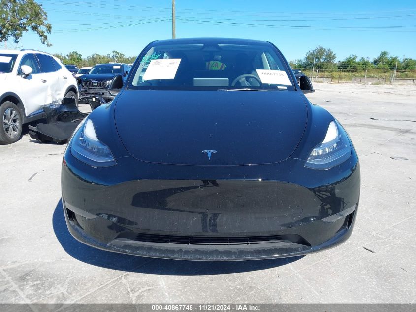 2023 Tesla Model Y Awd/Long Range Dual Motor All-Wheel Drive VIN: 7SAYGDEEXPA158898 Lot: 40867748