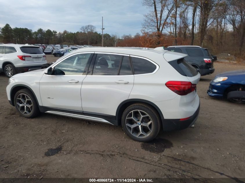 VIN WBXHT3C36J5F91124 2018 BMW X1, Xdrive28I no.14