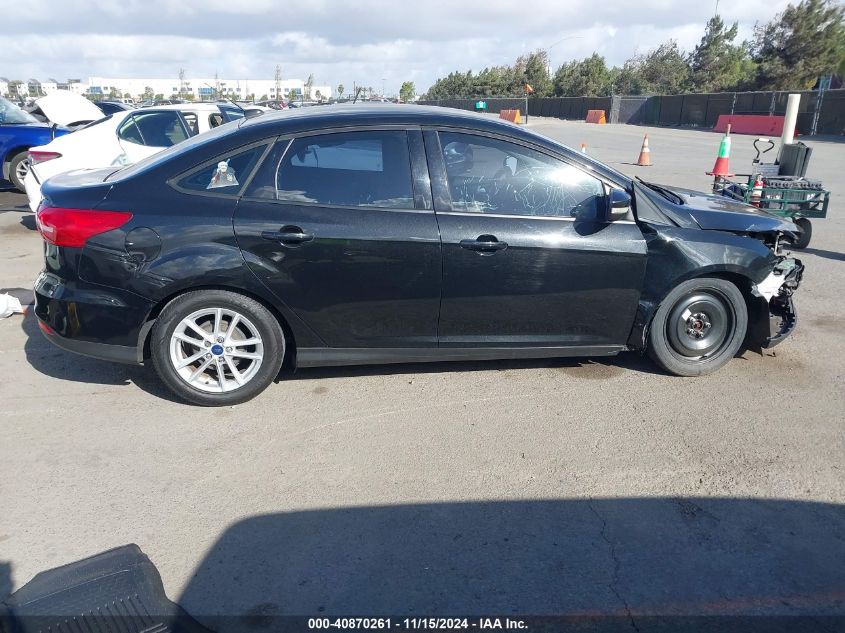 2015 Ford Focus Se VIN: 1FADP3F23FL205610 Lot: 40870261