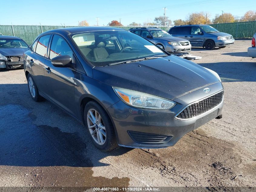 VIN 1FADP3F24FL233562 2015 FORD FOCUS no.1