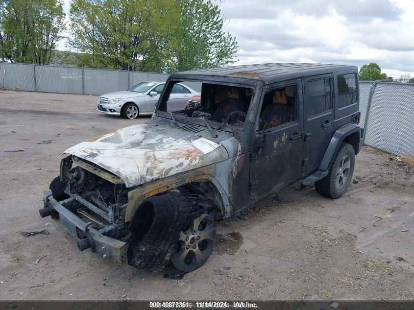 2014 Jeep Wrangler Unlimited Sahara VIN: 1C4BJWEG9EL287083 Lot: 40873361