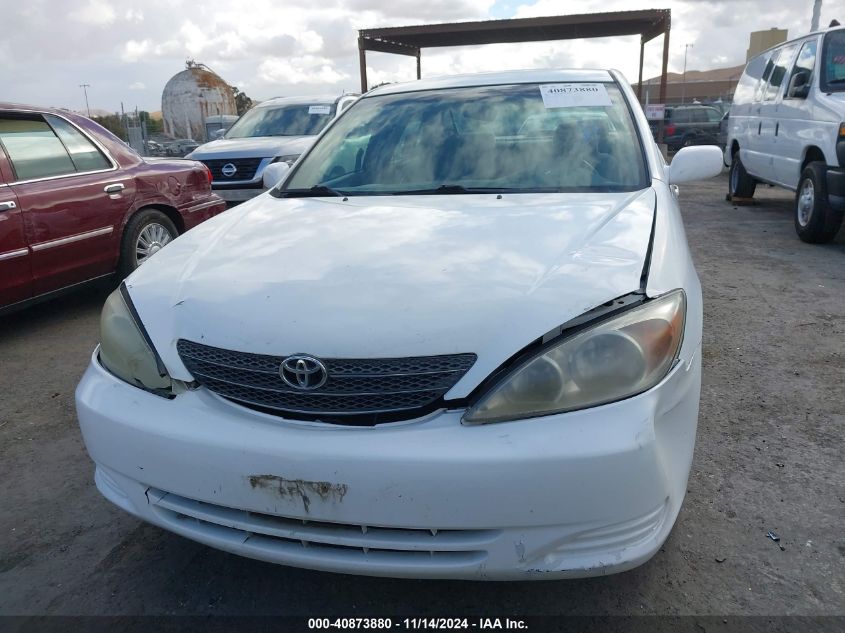 2002 Toyota Camry Le VIN: 4T1BE32K62U571834 Lot: 40873880