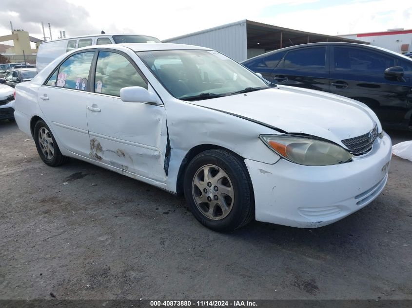 2002 Toyota Camry Le VIN: 4T1BE32K62U571834 Lot: 40873880