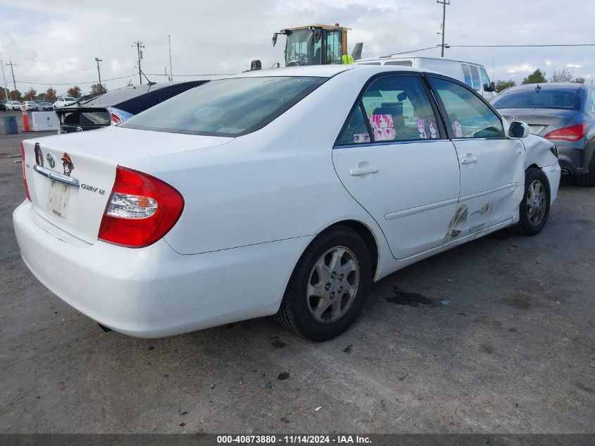 2002 Toyota Camry Le VIN: 4T1BE32K62U571834 Lot: 40873880