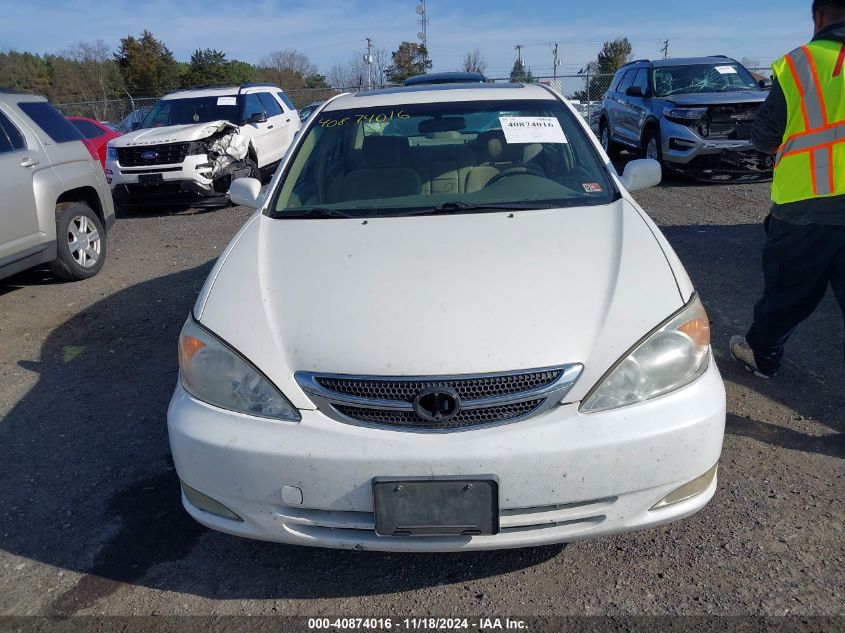 2004 Toyota Camry Le VIN: JTDBE32K940283448 Lot: 40874016