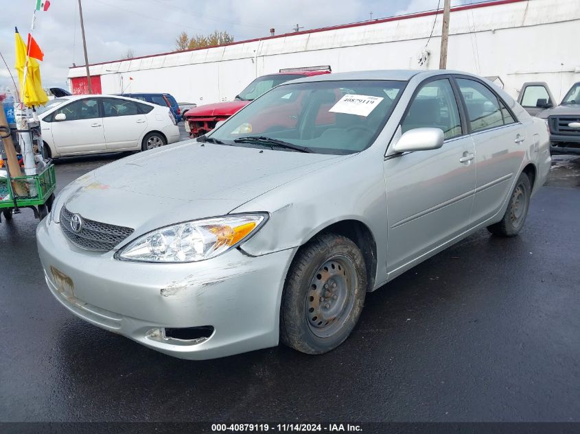 2003 Toyota Camry Le VIN: JTDBE32K730143445 Lot: 40879119