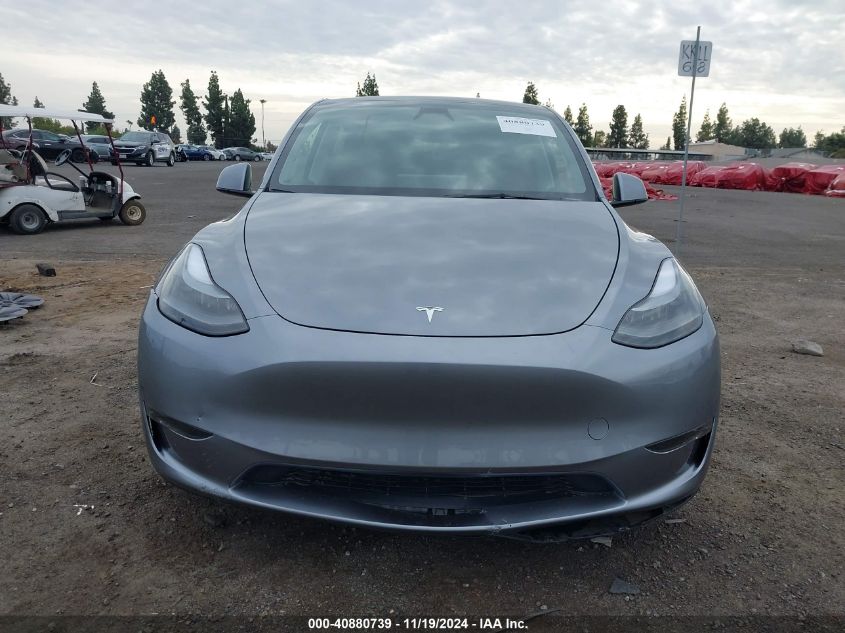 2024 Tesla Model Y Long Range Dual Motor All-Wheel Drive VIN: 7SAYGDEE1RA312143 Lot: 40880739