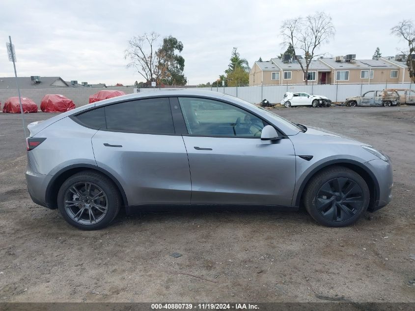 2024 Tesla Model Y Long Range Dual Motor All-Wheel Drive VIN: 7SAYGDEE1RA312143 Lot: 40880739