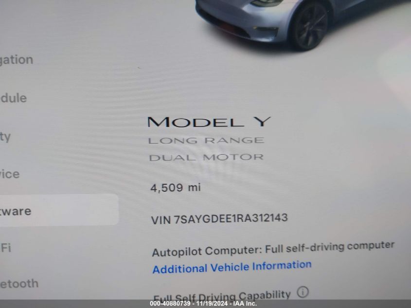 2024 Tesla Model Y Long Range Dual Motor All-Wheel Drive VIN: 7SAYGDEE1RA312143 Lot: 40880739