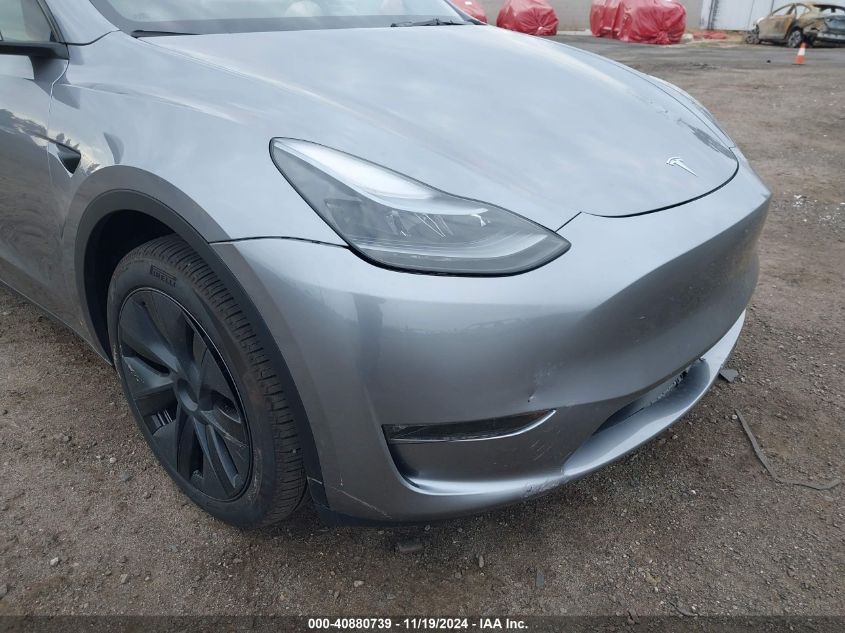 2024 Tesla Model Y Long Range Dual Motor All-Wheel Drive VIN: 7SAYGDEE1RA312143 Lot: 40880739