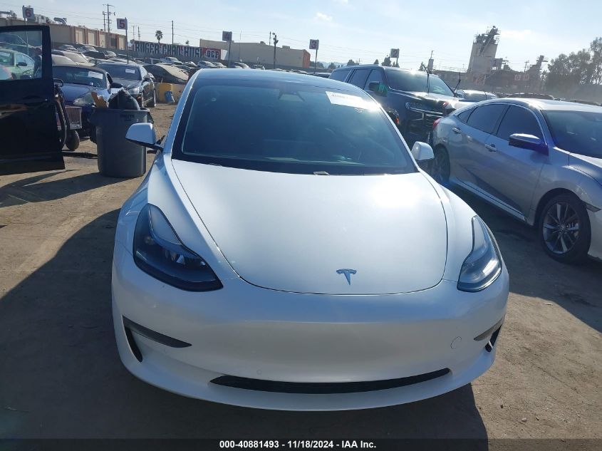 2021 Tesla Model 3 Standard Range Plus Rear-Wheel Drive VIN: 5YJ3E1EA0MF002148 Lot: 40881493