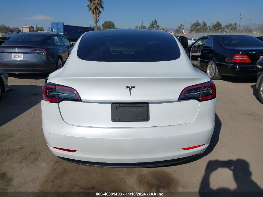 2021 Tesla Model 3 Standard Range Plus Rear-Wheel Drive VIN: 5YJ3E1EA0MF002148 Lot: 40881493