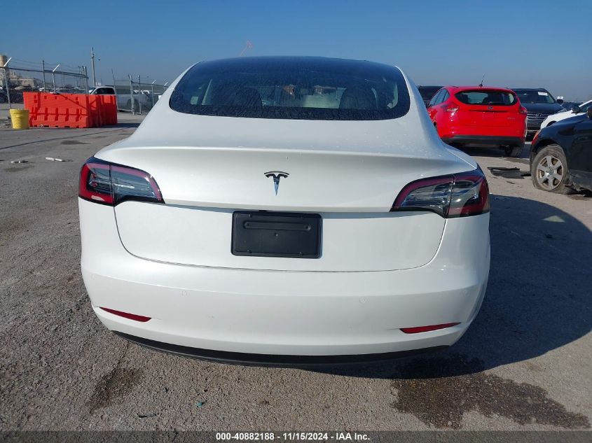 2021 Tesla Model 3 Standard Range Plus Rear-Wheel Drive VIN: 5YJ3E1EAXMF976865 Lot: 40882188