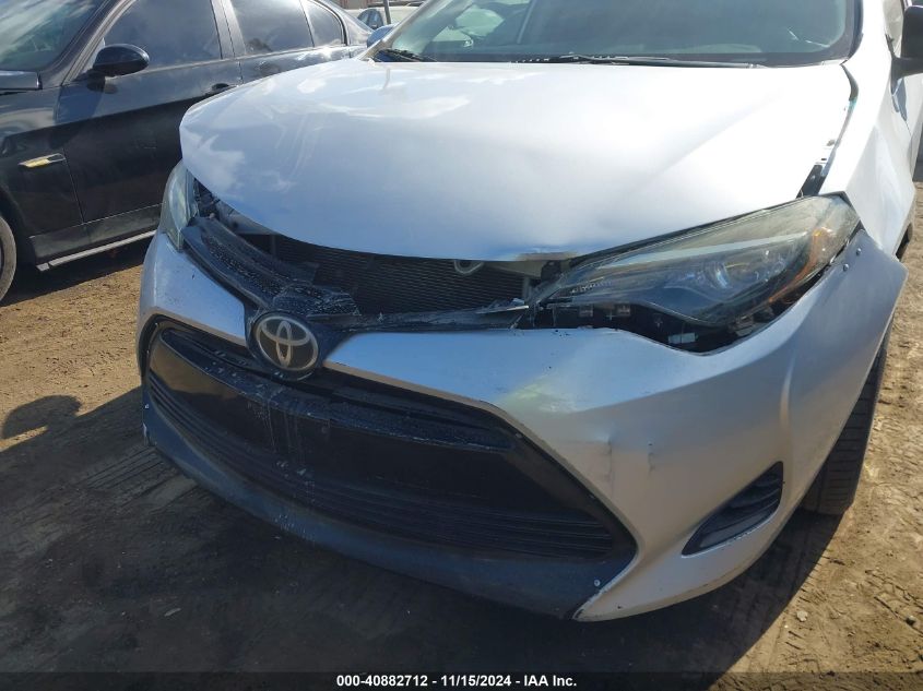 2017 Toyota Corolla Le VIN: 5YFBURHEXHP663384 Lot: 40882712