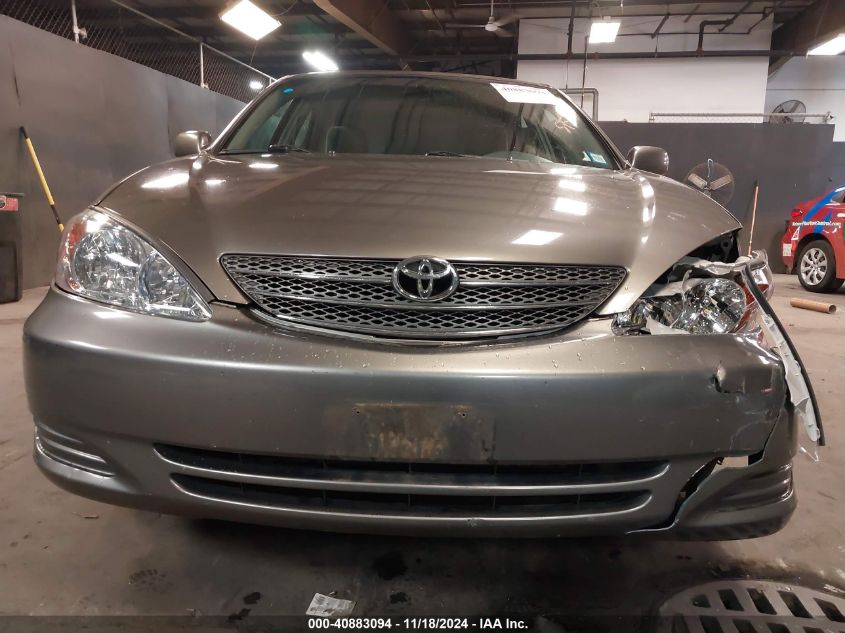 2004 Toyota Camry Le VIN: 4T1BE32K24U875097 Lot: 40883094