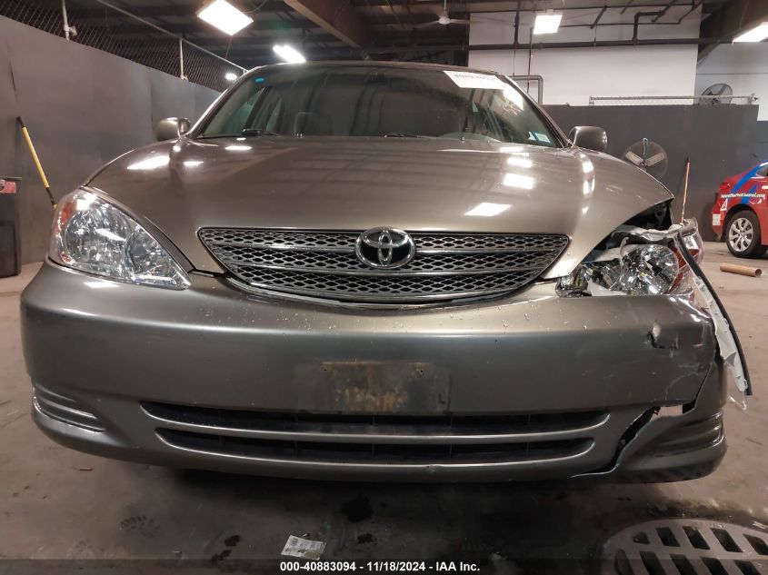 2004 Toyota Camry Le VIN: 4T1BE32K24U875097 Lot: 40883094