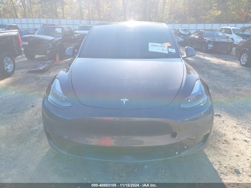 2023 Tesla Model Y Awd/Long Range Dual Motor All-Wheel Drive VIN: 7SAYGDEE5PA188729 Lot: 40883105