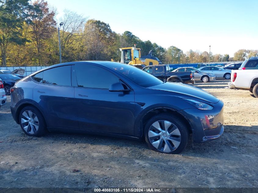 2023 Tesla Model Y Awd/Long Range Dual Motor All-Wheel Drive VIN: 7SAYGDEE5PA188729 Lot: 40883105